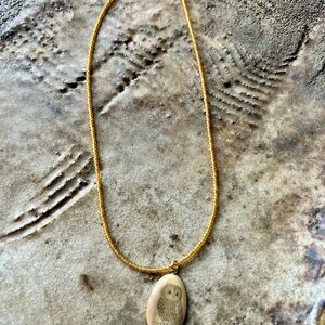 Vintage carved owl pendant on beaded necklace